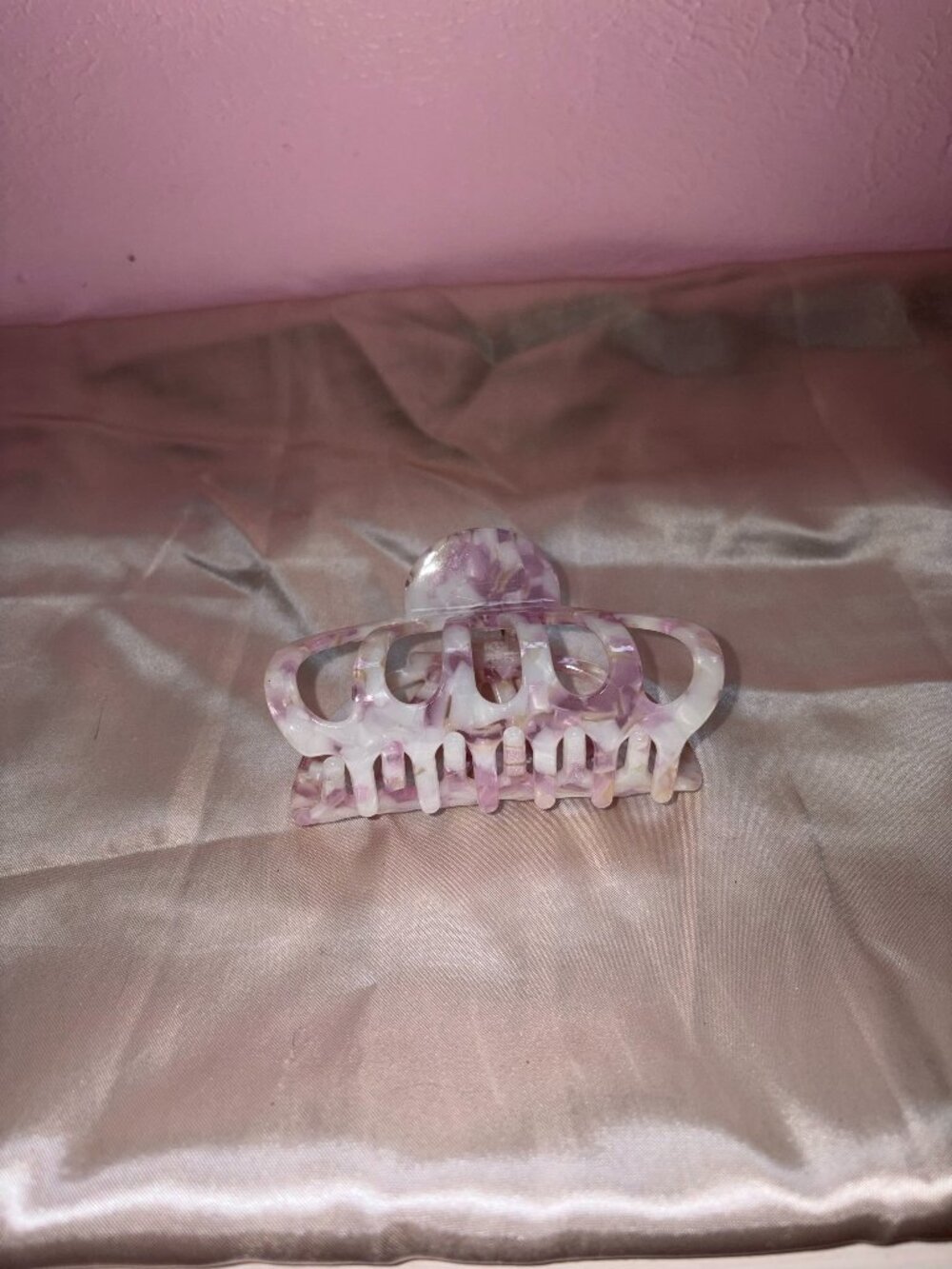 white and purple hair clip
